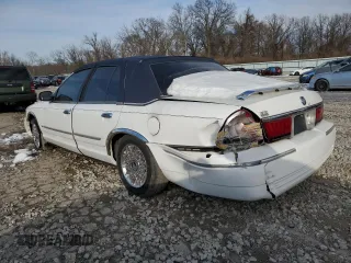 2001 Mercury Grand Marquis GS z VIN 2MEFM74W61X695639, wystawiony jako Copart lot #42099295 z przebiegiem 137 501 mil mil oraz Nie do naprawy • Non repairable. Historia ofert i sprzedaży dostępna na DreamBid. Obrazek 2.