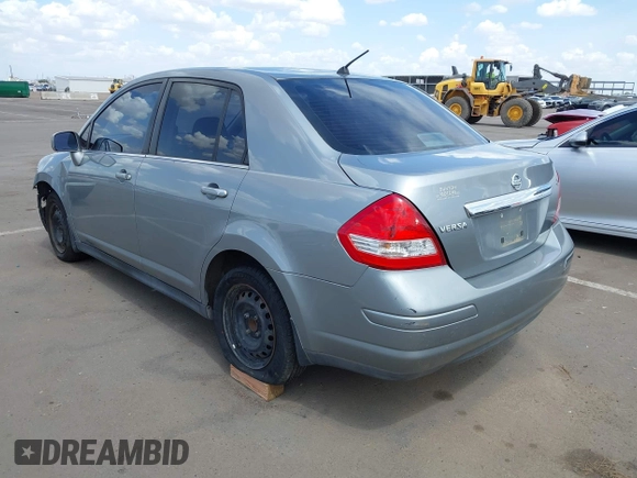 2009 Nissan Versa 1.8 S with VIN 3N1BC11E39L381507, listed as a IAAI auction lot 41956643 with 120,730 mi miles. Bid and sale history available at carsss.com. Image 3.