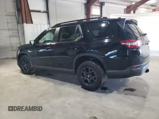 2023 Honda Pilot TrailSport with VIN 5FNYG1H63PB031249, listed as a Copart auction lot 85163934 with 12,058 mi miles and Salvage Title. Bid and sale history available at carsss.com. Image 2.
