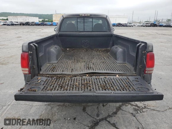 2002 Dodge Dakota с VIN 1B7FL46XX2S511526, выставлен на аукционе Copart как лот 57955594 с пробегом 244 367 миль миль и Списание • Salvage title. История ставок и продаж доступна на DreamBid. Изображение 6.