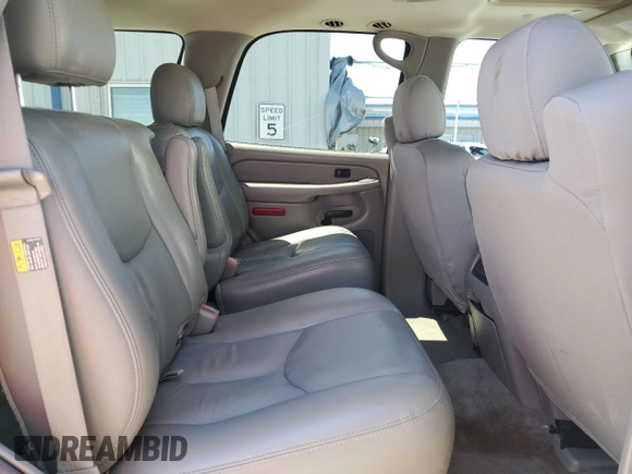 2005 Chevrolet Tahoe Z71 z VIN 1GNEK13T05R187021, wystawiony jako Copart lot #57180025 z przebiegiem 135 572 mil mil oraz Szkoda całkowita • Salvage title. Historia ofert i sprzedaży dostępna na DreamBid. Obrazek 11.