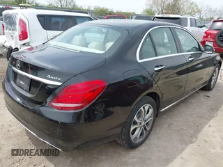 2015 Mercedes-Benz C with VIN 55SWF4KBXFU040013, listed as a IAAI auction lot 42136894 with 123,460 mi miles. Bid and sale history available at carsss.com. Image 4.