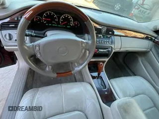 2002 Cadillac DeVille DTS with VIN 1G6KF57912U135771, listed as a Copart auction lot 82052554 with 56,268 mi miles and Clean Title. Bid and sale history available at carsss.com. Image 9.