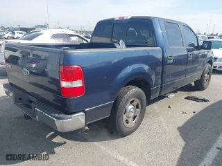 2005 Ford F-150 XLT with VIN 1FTRW12W95FA28428, listed as a IAAI auction lot 41645714 with 189,275 mi miles. Bid and sale history available at carsss.com. Image 4.