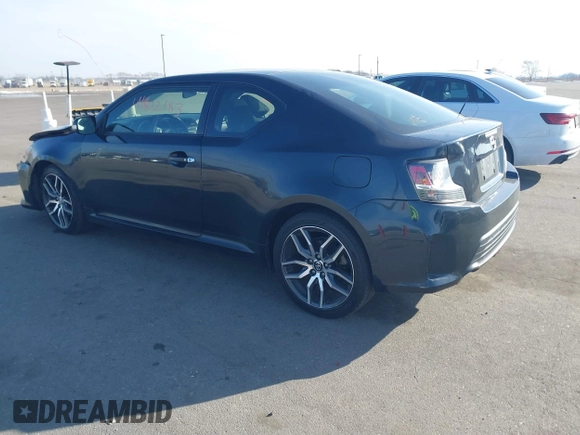 2015 Scion tC with VIN JTKJF5C71F3090963, listed as a IAAI auction lot 41802183 with 107,650 mi miles. Bid and sale history available at carsss.com. Image 3.