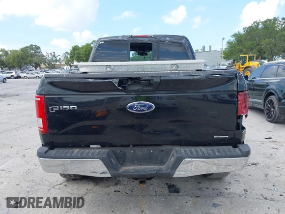 2015 Ford F-150 XLT with VIN 1FTEW1C81FFB05261, listed as a IAAI auction lot 42193554 with Not Provided miles and . Bid and sale history available at carsss.com. Image 16.
