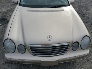 2001 Mercedes-Benz E-Class with VIN WDBJF70JX1B220786, listed as a Copart auction lot 71808344 with 94,476 mi miles and Salvage Title. Bid and sale history available at carsss.com. Image 11.