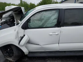 2020 Toyota Tacoma SR5 z VIN 3TMCZ5AN2LM339564, wystawiony jako Copart lot #57871255 z przebiegiem Nie podano mil oraz Szkoda całkowita • Salvage title. Historia ofert i sprzedaży dostępna na DreamBid. Obrazek 7.