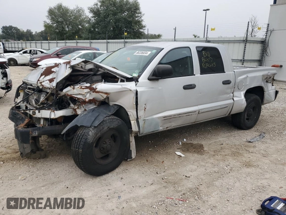 2005 Dodge Dakota Laramie with VIN 1D7HW58N75S100449, listed as a Copart auction lot 86336834 with Not Provided miles and Salvage Title. Bid and sale history available at DreamBid. Image 1.