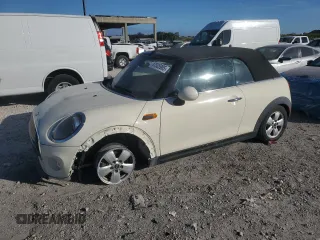 2019 MINI Convertible Cooper z VIN WMWWG5C59K3D01832, wystawiony jako Copart lot #87505905 z przebiegiem 42 666 mil mil oraz Nie do naprawy • Non repairable. Historia ofert i sprzedaży dostępna na DreamBid. Obrazek 1.