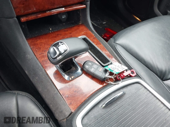 2014 Chrysler 300 with VIN 2C3CCAAG7EH249196, listed as a IAAI auction lot 42180023 with 48,241 mi miles and . Bid and sale history available at DreamBid. Image 11.