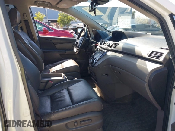 2015 Honda Odyssey Touring Elite with VIN 5FNRL5H91FB038099, listed as a IAAI auction lot 41829649 with 167,017 mi miles and . Bid and sale history available at DreamBid. Image 5.