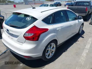 2014 Ford Focus Titanium with VIN 1FADP3N27EL330366, listed as a IAAI auction lot 42719377 with 97,009 mi miles and . Bid and sale history available at DreamBid. Image 4.