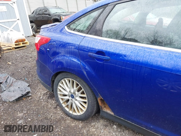 2014 Ford Focus Titanium with VIN 1FADP3J28EL240911, listed as a IAAI auction lot 42082812 with 144,625 mi miles. Bid and sale history available at carsss.com. Image 15.