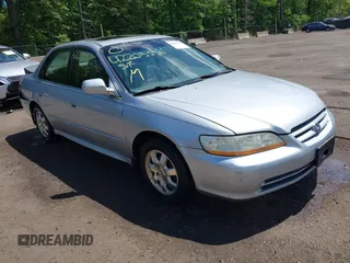 2001 Honda Accord EX z VIN 1HGCG56611A064109, wystawiony jako IAAI lot #42205356 z przebiegiem 208 898 mil mil oraz . Historia ofert i sprzedaży dostępna na DreamBid. Obrazek 1.