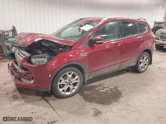 2014 Ford Escape Titanium with VIN 1FMCU9JX0EUC76045, listed as a IAAI auction lot 41119637 with 105,000 mi miles. Bid and sale history available at carsss.com. Image 2.