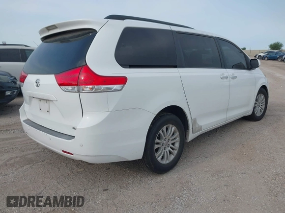 2011 Toyota Sienna XLE AAS with VIN 5TDYK3DC8BS108689, listed as a IAAI auction lot 42308965 with 179,524 mi miles and . Bid and sale history available at DreamBid. Image 4.