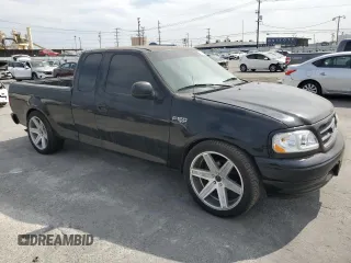 1999 Ford F-150 with VIN 1FTZX172XXKB22122, listed as a Copart auction lot 52987845 with 78,431 mi miles and Salvage title. Bid and sale history available at DreamBid. Image 4.