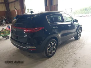 2021 Kia Sportage EX z VIN KNDPNCAC5M7886551, wystawiony jako IAAI lot #42645206 z przebiegiem 49 312 mil mil oraz . Historia ofert i sprzedaży dostępna na DreamBid. Obrazek 4.