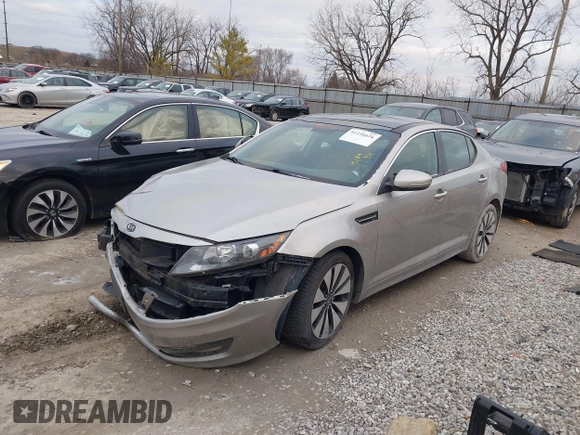2012 Kia Optima SX with VIN 5XXGR4A62CG027184, listed as a IAAI auction lot 41236626 with 121,686 mi miles and . Bid and sale history available at carsss.com. Image 2.