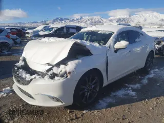 2016 Mazda 6 i Grand Touring с VIN JM1GJ1W5XG1446200, выставлен на аукционе Copart как лот 48944925 с пробегом Не указан миль и Списание • Salvage title. История ставок и продаж доступна на DreamBid. Изображение 1.