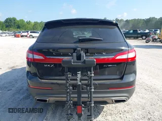 2016 Lincoln MKX Reserve with VIN 2LMTJ6LP9GBL27835, listed as a IAAI auction lot 42175905 with 87,541 mi miles. Bid and sale history available at carsss.com. Image 16.