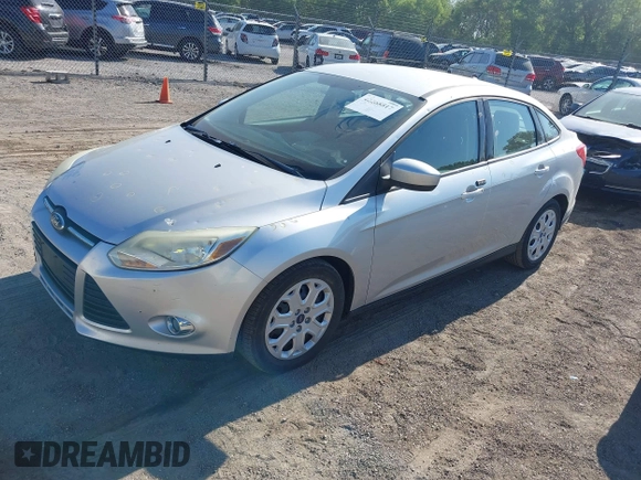 2012 Ford Focus SE with VIN 1FAHP3F20CL166889, listed as a IAAI auction lot 42268817 with 132,717 mi miles and . Bid and sale history available at DreamBid. Image 2.