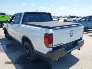 2023 Honda Ridgeline Black Edition with VIN 5FPYK3F8XPB009920, listed as a IAAI auction lot 42086798 with 37,192 mi miles and . Bid and sale history available at DreamBid. Image 3.