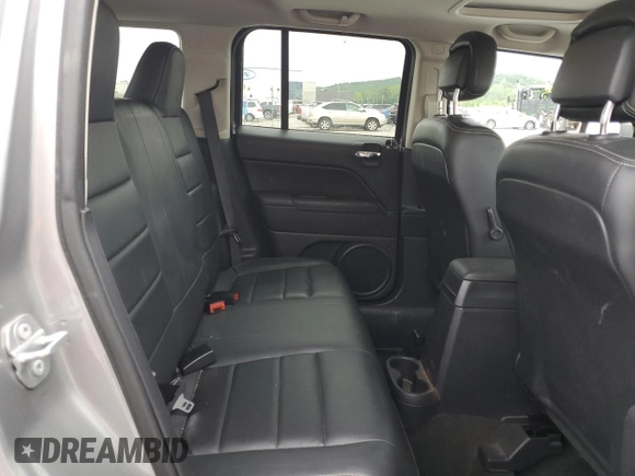 2016 Jeep Patriot Latitude with VIN 1C4NJRFB0GD522016, listed as a Copart auction lot 54688695 with 104,587 mi miles and Salvage title. Bid and sale history available at DreamBid. Image 11.