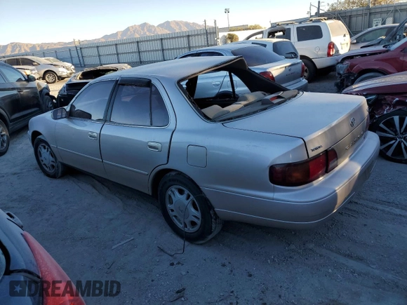 1995 Toyota Camry LE with VIN 4T1GK12E5SU76389, listed as a Copart auction lot 83120474 with 245,875 mi miles and Non Repairable. Bid and sale history available at carsss.com. Image 2.
