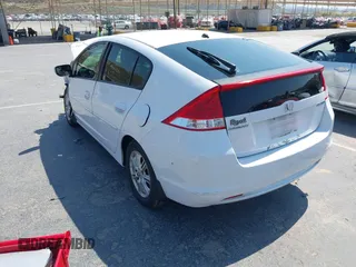2010 Honda Insight EX with VIN JHMZE2H71AS012927, listed as a IAAI auction lot 42455037 with Not provided miles and . Bid and sale history available at DreamBid. Image 3.