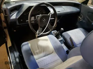 1986 Honda Civic z VIN JHMAF5314GS037036, wystawiony jako Copart lot #44577705 z przebiegiem 286 229 mil mil oraz Tytuł czysty. Historia ofert i sprzedaży dostępna na DreamBid. Obrazek 8.