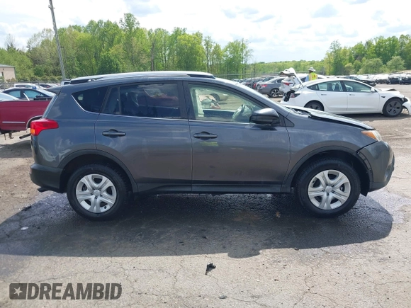 2015 Toyota RAV4 LE with VIN JTMBFREV2FD104409, listed as a IAAI auction lot 42084145 with 102,948 mi miles and . Bid and sale history available at DreamBid. Image 13.