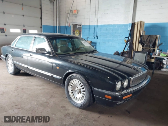 1997 Jaguar XJ Vanden Plas with VIN SAJKX6243VC800080, listed as a IAAI auction lot 42190859 with 192,979 mi miles and . Bid and sale history available at DreamBid. Image 1.