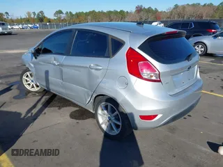 2019 Ford Fiesta SE with VIN 3FADP4EJ0KM107058, listed as a IAAI auction lot 40979683 with 116,854 mi miles. Bid and sale history available at carsss.com. Image 3.
