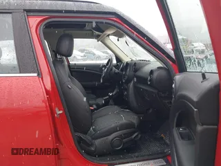 2014 MINI Countryman S z VIN WMWZC5C57EWM17149, wystawiony jako IAAI lot #41246831 z przebiegiem 112 369 mil mil oraz . Historia ofert i sprzedaży dostępna na DreamBid. Obrazek 5.