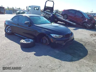 2015 BMW M4 with VIN WBS3U9C56FP967590, listed as a IAAI auction lot 41732730 with 48,927 mi miles. Bid and sale history available at carsss.com. Image 1.