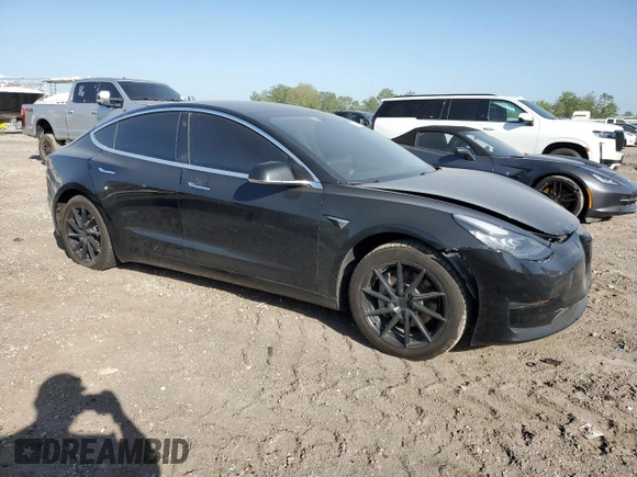 2019 Tesla Model 3 Mid Range z VIN 5YJ3E1EAXKF398909, wystawiony jako Copart lot #52504645 z przebiegiem 101 667 mil mil oraz Szkoda całkowita • Salvage title. Historia ofert i sprzedaży dostępna na DreamBid. Obrazek 4.