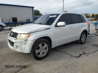 2010 Suzuki Grand Vitara Premium z VIN JS3TE0D2XA4110124, wystawiony jako Copart lot #74387914 z przebiegiem 91 106 mil mil oraz Szkody całkowita. Historia ofert i sprzedaży dostępna na DreamBid. Obrazek 1.