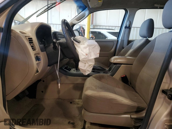 2007 Ford Escape XLS с VIN 1FMYU02Z37KA61744, выставлен на аукционе Copart как лот 52870065 с пробегом Не указан миль и Списание • Salvage title. История ставок и продаж доступна на DreamBid. Изображение 7.