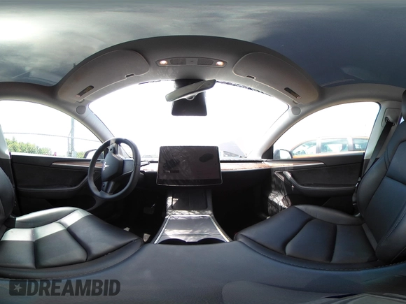 2023 Tesla Model Y Long Range with VIN 7SAYGAEE7PF615751, listed as a IAAI auction lot 42297819 with 31,201 mi miles and . Bid and sale history available at DreamBid. Image 22.