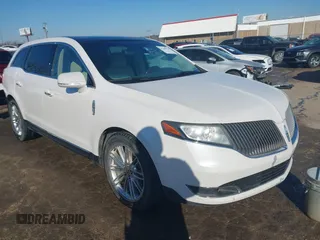 2014 Lincoln MKT EcoBoost with VIN 2LMHJ5AT9EBL52165, listed as a IAAI auction lot 41246424 with 154,332 mi miles and . Bid and sale history available at DreamBid. Image 1.