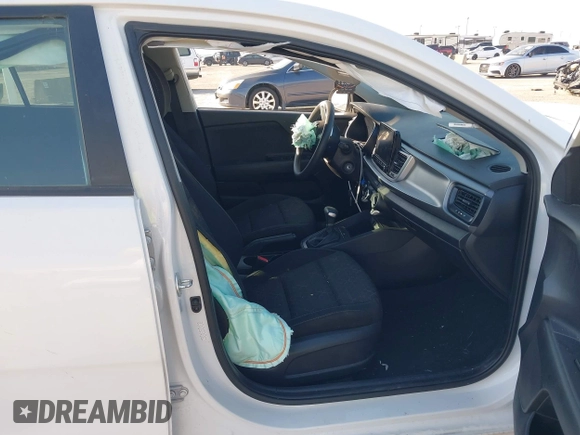 2023 Kia Rio LX with VIN 3KPA24AD9PE598789, listed as a IAAI auction lot 42019297 with 16,232 mi miles. Bid and sale history available at carsss.com. Image 5.