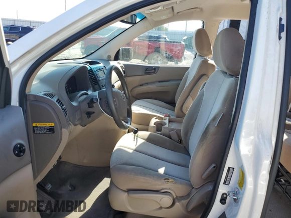 2012 Kia Sedona LX with VIN KNDMG4C74C6427812, listed as a Copart auction lot 71851574 with 89,864 mi miles and Salvage Title. Bid and sale history available at carsss.com. Image 7.