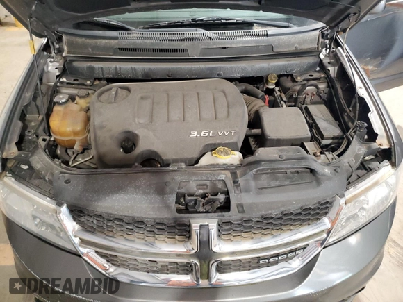 2012 Dodge Journey SXT with VIN 3C4PDDBG3CT168548, listed as a Copart auction lot 64881345 with 105,112 mi miles and Clean title. Bid and sale history available at DreamBid. Image 12.