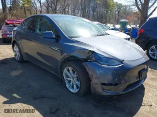2023 Tesla Model Y Long Range with VIN 7SAYGDEEXPA175104, listed as a IAAI auction lot 41821928 with 52,791 mi miles. Bid and sale history available at carsss.com. Image 1.