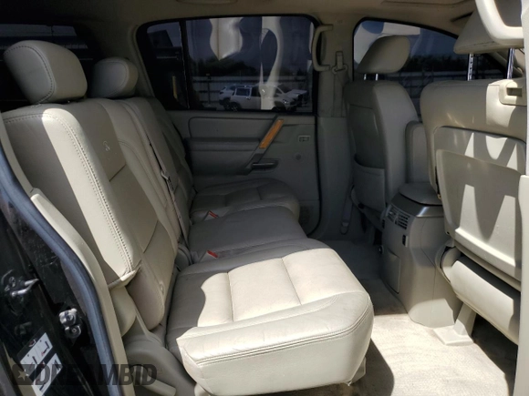 2005 Infiniti QX56 z VIN 5N3AA08C65N800718, wystawiony jako Copart lot #54229265 z przebiegiem 222 803 mil mil oraz Szkoda całkowita • Salvage title. Historia ofert i sprzedaży dostępna na DreamBid. Obrazek 11.