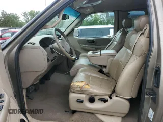 2002 Ford F-150 XL with VIN 1FTRX18L02NA58574, listed as a Copart auction lot 57156255 with 291,950 mi miles and Salvage title. Bid and sale history available at DreamBid. Image 7.
