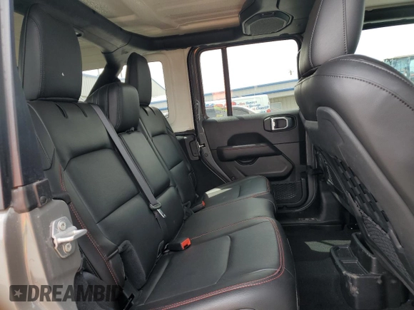 2023 Jeep Wrangler Rubicon with VIN 1C4JJXFG4PW523432, listed as a Copart auction lot 51642975 with 23,631 mi miles and Salvage title. Bid and sale history available at DreamBid. Image 10.