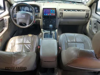 2002 Jeep Grand Cherokee Limited with VIN 1J4GX58S52C121941, listed as a Copart auction lot 55472015 with 182,225 mi miles and Salvage Title. Bid and sale history available at DreamBid. Image 8.